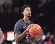  ?? Young Kwak / Associated Press ?? West Haven’s Tahj Eaddy shoots a free throw last January against Gonzaga while playing for the Santa Clara men’s basktball team.