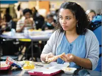  ?? ?? Burke County High School junior Jada Curd eats lunch with friends at school in Waynesboro.