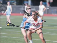  ?? JOHN BLAINE — FOR THE TRENTONIAN ?? Lawrencevi­lle’s Olivia Koch, right, tries to move past Notre Dame’s Emily Guenther, left, during a semifinal MCT game.