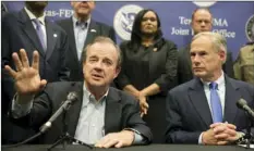  ?? JAY JANNER/AUSTIN AMERICAN-STATESMAN VIA AP ?? Gov. Greg Abbott (right) listens as Texas A&M University System Chancellor John Sharp, head of the Governor’s Commission to Rebuild Texas, speaks about Hurricane Harvey recovery efforts at a news conference at the Texas — FEMA Joint Field Office in...