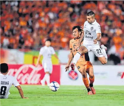  ??  ?? Buriram forward Gilberto Macena, No.22, in action against Nakhon Ratchasima.