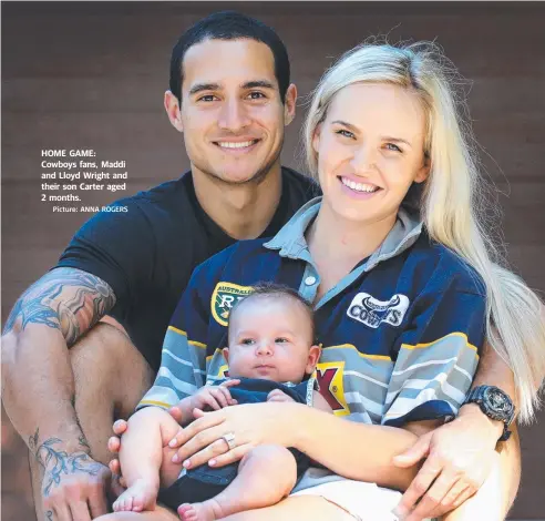  ?? Picture: ANNA ROGERS ?? HOME GAME: Cowboys fans, Maddi and Lloyd Wright and their son Carter aged 2 months.
