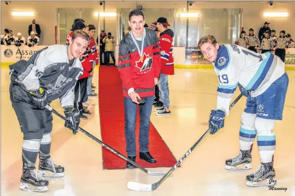  ?? GARY MANNING ?? Drake Batherson drops the puck at the Valley Wildcats game Jan. 7. Batherson, a former Wildcat, helped Canada win gold at the World Juniors.