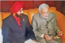  ??  ?? MEMORABLE MOMENT: Indian Social Club, Salalah branch, chairman Manpreet Singh with Narendra Modi in Salalah in 2008.