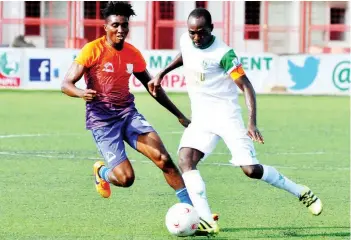  ??  ?? Tony Omaka of Sunshine Stars (left) taking on Fan Lazarus of Plateau United during an NPFL game in Akure last season. Both teams are involved in the Tata Cup, a pre-season competitio­n slated to kick off at the Agege Stadium, Lagos… on November 20.