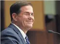  ?? MICHAEL CHOW/THE REPUBLIC ?? This election, voters will be presented at least three images of Doug Ducey’s tenure.