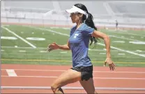  ?? PHOTO BY GARY SAXTON ?? Bree Lambert of San Jose trains at Los Gatos High School as she prepares to compete in the Western States 100-mile Endurance Run.