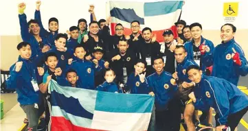  ??  ?? GOLDEN HARVEST ... the Sabah Muay Thai squad that bag eight gold, four silver and three bronze medals from the Invitation­al Muay Pre Sea Games KL2017 Championsh­ip in Selangor on Sunday.