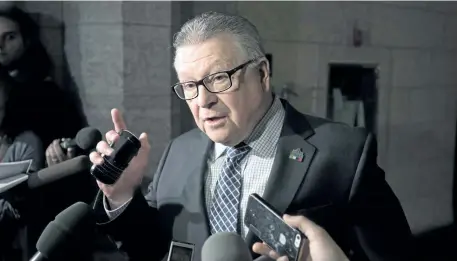  ?? JUSTIN TANG/THE CANADIAN PRESS ?? Public Safety Minister Ralph Goodale speaks to reporters as he arrives for a cabinet meeting on Parliament Hill, in Ottawa on Tuesday.