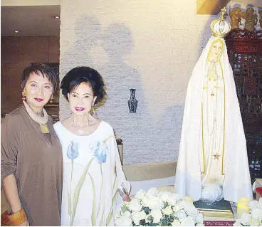  ??  ?? Marian devotees Meldy Cojuangco and Fe Rodriguez who says, “What I loved most about Meldy was her childlike quality.”