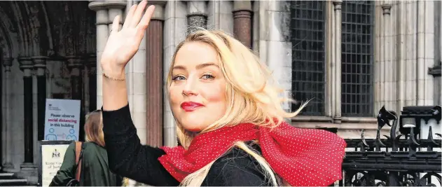  ?? PHOTO: PA ?? Claims: Actress Amber Heard arriving at the High Court in London yesterday for ex-husband Johhny Depp’s libel case against NGN, publishers of ‘The Sun’.