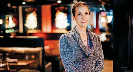  ?? [PHOTO BY CHRIS LANDSBERGE­R, THE OKLAHOMAN] ?? Bellini’s Undergroun­d owner and operator Diana Unsell Buthion poses for a photo at the restaurant at 6305 Waterford Blvd, Suite 100 in Oklahoma City.