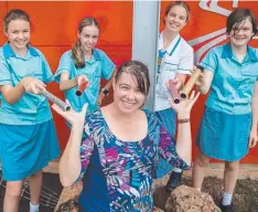  ??  ?? RELAY READY: St Andrew's Catholic College Year 9 student Tayla Gunton, Year 7 students Arya Howarth-Dennis and Tasha Linklater, Year 12 student Emma Simpson and teacher Kate Maccoll.