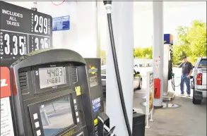  ?? File photo ?? Regular gas prices near the $ 3 mark in Clifton Park, NY.