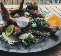  ??  ?? Chef Ross’s succulent spicy glazed chicken wings feature a sweet/spicy/ sour/fruity flavour play that works like a charm.