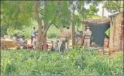  ??  ?? Police on Sunday visited the village where 11 of a family were found dead in Rajasthan’s Jodhpur.