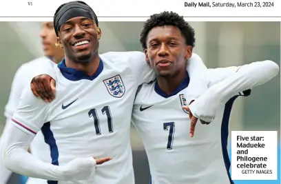  ?? GETTY IMAGES ?? Five star: Madueke and Philogene celebrate