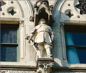  ?? Ken Dixon / Hearst Connecticu­t Media ?? The 8-foot sculpture of Major John Mason in a niche above the Capitol’s north steps. While others among the state’s founders depicted in the niches owned slaves, Mason’s reputation became particular­ly controvers­ial in the age of Black Lives matter.