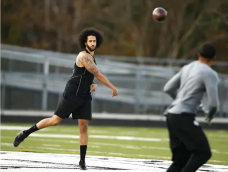  ??  ?? STILL HAVE IT?: Colin Kaepernick delivers a pass during a workout for NFL teams yesterday in Georgia.