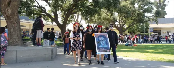  ?? RECORDER PHOTO BY JUAN AVILA ?? Around 200 Monache High School students participat­ed in a ‘Dia de los Muertos’ procession around campus Friday, Nov. 2.