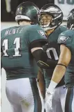  ?? APPHOTO ?? FLYING TO THE TOP: Mack Hollins celebrates with Carson Wentz after they connected for a long touchdown in the Eagles’ victory last night.