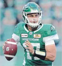  ?? MARK TAYLOR THE CANADIAN PRESS ?? Former Tiger-Cat QB Zach Collaros has been in a first string battle in Saskatchew­an with Canadian Brandon Bridge.