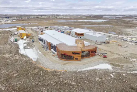  ?? THE CANADIAN PRESS/HO-POLAR KNOWLEDGE CANADA ?? A decade after it was first promised under former prime minister Stephen Harper, Canada’s new High Arctic Research Station in Nunavut is poised to open this fall. The station is already hosting scientists from around the world and plans to link...