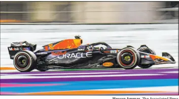  ?? Hassan Ammar The Associated Press ?? Red Bull driver Max Verstappen steers his car during the Saudi Arabia Formula One Grand Prix, where he moved from 15th to second during the course of the race.