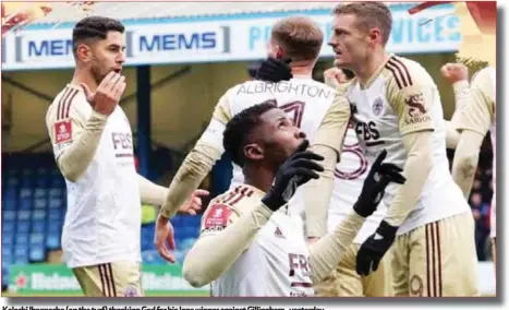  ?? ?? Kelechi Iheanacho (on the turf) thanking God for his lone winner against Gillingham...yesterday