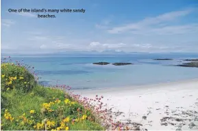  ??  ?? One of the island’s many white sandy beaches.