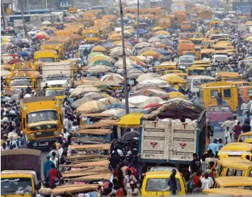  ?? Foto: P. U. Ekpeki, afp ?? Eine der am dichtesten besiedelte­n Megacitys der Welt wächst immer weiter: Lagos in Nigeria.
