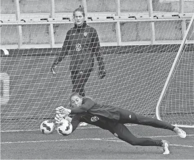  ?? KYLE ROBERTSON/COLUMBUS DISPATCH ?? U.S. women's national team goalie Aubrey Kingsbury makes a save during practice in Columbus, Ohio, on Friday.