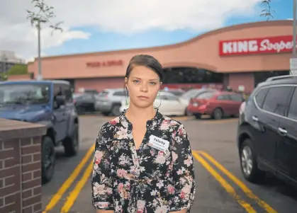  ?? Photos by RJ Sangosti, The Denver Post ?? Felicity Evitt, is a front-end manager at a King Soopers in Denver where a dozen employees have tested positive and one recently died. Evitt was friends with the employee who died and is upset that essential workers aren’t being offered better workplace protection­s.