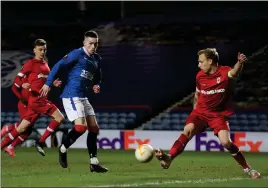  ??  ?? Ryan Kent scores to make it 3-1 to Rangers on the night