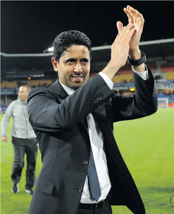  ?? — GETTY IMAGES FILES ?? Paris Saint-Germain’s Qatari president Nasser Al-Khelaifi, applauding one of his soccer club’s victories in 2015, is in a less celebrator­y mood now that he is under investigat­ion for suspected bribery of a top FIFA executive to get World Cup...