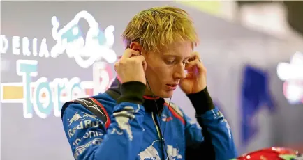  ?? GETTY IMAGES ?? New Zealand Formula One driver Brendon Hartley tunes in ahead of winter testing for Toro Rosso in Montmelo, Spain, this week.