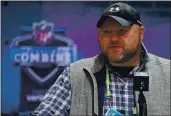  ?? MICHAEL CONROY — THE ASSOCIATED PRESS, FILE ?? Jets general manager Joe Douglas speaks during a 2020 press conference at the scouting combine in Indianapol­is. The NFL’s salary cap will be $182.5 million per team in the upcoming season, a drop of 8% from 2020.