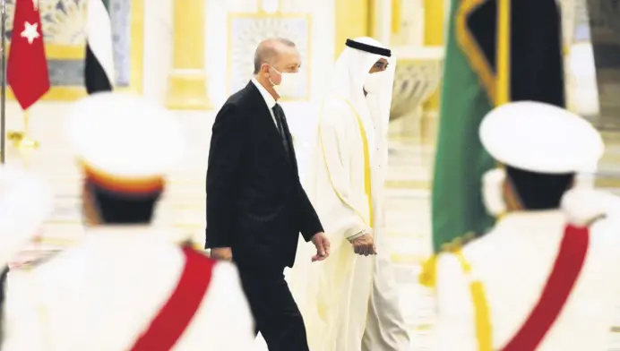  ?? ?? President Recep Tayyip Erdoğan and Abu Dhabi Crown Prince Sheikh Mohammed bin Zayed Al Nahyan look over an honor guard at Qasr Al Watan in Abu Dhabi, United Arab Emirates, Feb. 14, 2022.