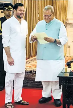  ??  ?? RJD leader Tejashwi Yadav meets Bihar Governor Satya Pal Malik on May 18 to stake his claim.