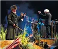  ??  ?? Simon Rattle conducts the LSO and several choirs at the Barbican