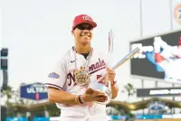  ?? ABBIE PARR/AP ?? Soto holds the trophy after winning the MLB All-Star Home Run Derby.