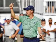  ?? GREGORY SHAMUS / GETTY IMAGES ?? Justin Thomas celebrates winning the World Golf Championsh­ip’s Bridgeston­e Invitation­al on Sunday in Akron.