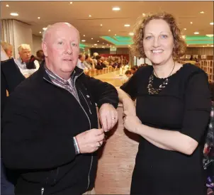  ??  ?? Pat Carter and Clr. Sinead Maguire ( FG) in the count centre on Sunday. Pic: Carl Brennan.