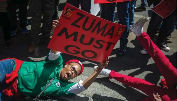  ?? MUJAHID SAFODIEN/AFP/GETTY IMAGES FILE PHOTO ?? A demonstrat­ion in Johannesbu­rg calls for the removal of South Africa’s President Jacob Zuma. For the past five years, South Africans have been reading that they are at a tipping point.