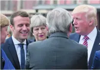  ?? Salvatore Cavalli / AP Photo ?? Angela Merkel, Emmanuel Macron, Theresa May and Donald Trump before the G7 summit in Taormina.