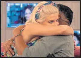  ??  ?? HUGS: The pair get close but fans believe it is a showmance