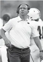  ?? MATTHEW PUTNEY/AP ?? Penn State head coach James Franklin looks to the scoreboard during the second half against Iowa on Saturday in Iowa City, Iowa.