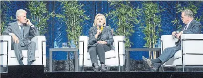  ?? LIVE NATION ?? Bill and Hillary Clinton — with moderator Frank McKenna on Tuesday night — can still command a stage, writes Rosie DiManno.