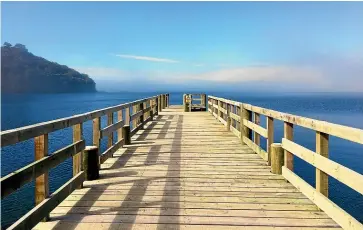  ??  ?? The pier on Rakiura Track, one of the country’s Great Walks.