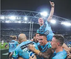  ?? Picture: GETTY IMAGES ?? Jack Wighton leads the Blues’ celebratio­ns.
